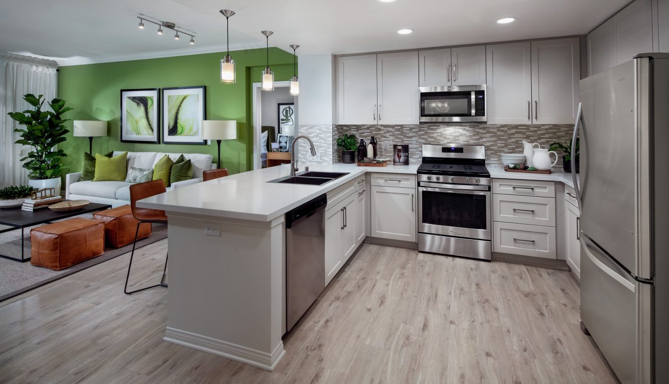 Interior view of kitchen at Serena at The Village at Irvine Spectrum Apartment Homes in Irvine, CA.